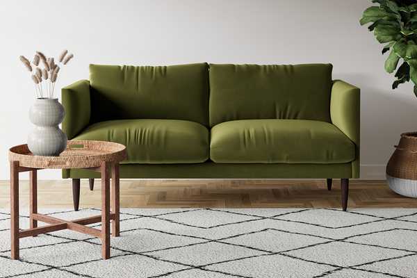 Swoon Luna velvet 2 seater sofa in fern green colour.